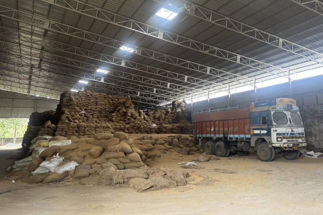 Picture 2. Inside LongStraw’s rice mill partner's warehouse, sacks of rice stacked for storage (photo courtesy of LongStraw Carbon)