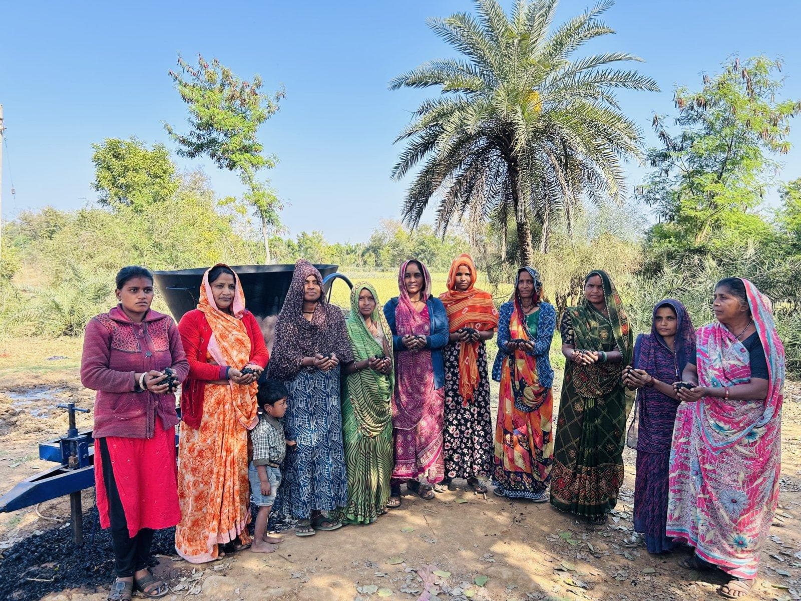 Picture 1. Training the local farmers of Gujarat to convert crop waste into biochar (photo courtesy of KriSHE Carbon)